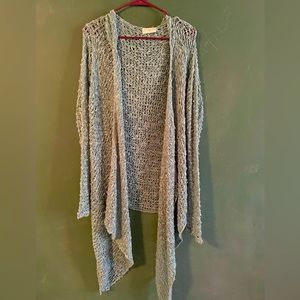 Teal blue crocheted wrap.